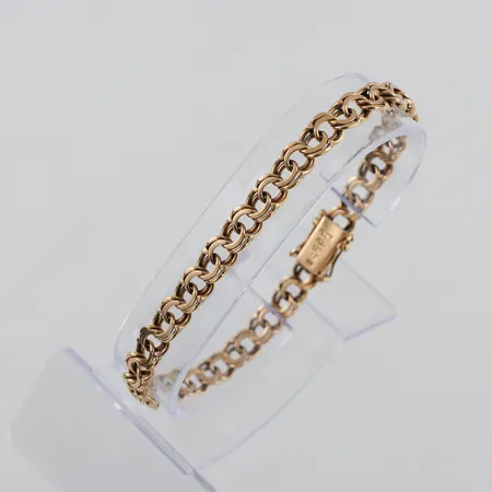 Armband 18k Bismarck,längd ca 19.5 cm,bredd 6.2 mm,bruksslitage. Vikt: 14,2 g