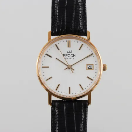 Herrur 18k Epoch Stockholm,diameter ca 33.4 mm,batteribyte krävs,etui medföljer.