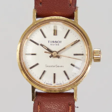 Damur Tissot SeastarSeven, 18K, Ø21,8mm, manuell, läderband ej original, repor på glas, gravyr, inga tillbehör, bruttovikt: 17,4g.