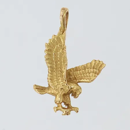 Hänge Örn, 24,5x14mm ink ögla, 18K.  Vikt: 2,1 g