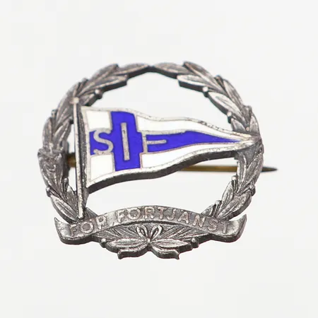 Brosch SIF med emaljdetaljer Ø20mm, silver 830/1000 Vikt: 3,9 g
