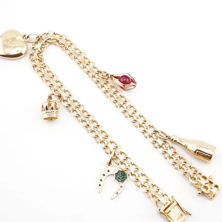 Armband, x-länk m 5 berlocker, 19cm, bredd 5mm, 18k, fint skick Vikt: 12,1 g