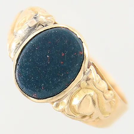 Ring med heliodor, stl 21½, bredd 3-13mm, något skev skena, heliodor med mindre nagg, 18K  Vikt: 6,5 g