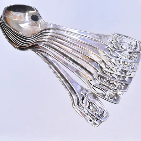 12 skedar, Alton, längd 10 cm, etui medföljer, silver 830/1000. Vikt: 101,5 g