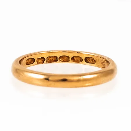 Graverat guld i 20K. Vikt: 5,7g.