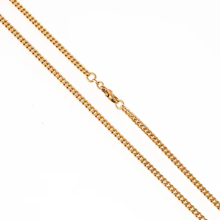 Kedja Pansar i 18K guld. Den är 46 cm lång, 3,5 mm bred och väger 20,1g. Karbinhake. 