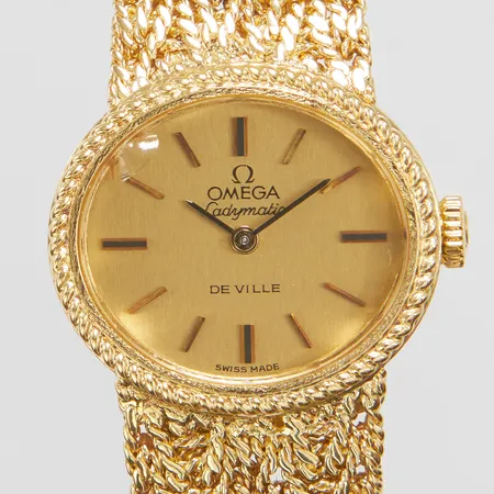 Damur Omega De Ville Ladymatic, 18K, bredd: ca.22mm, automatisk, ref.nr: 751.271, integrerad länk 18K, längd: 17cm, skada på glaset, bruttovikt 42,6g, box medföljer