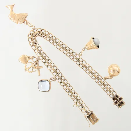 Armband X-länk med fem berlocker, längd: 18,5cm, bredd: 5,8-2,7mm, en berlock bucklig, en berlock ögla defekt, 18K  Vikt: 18,7 g