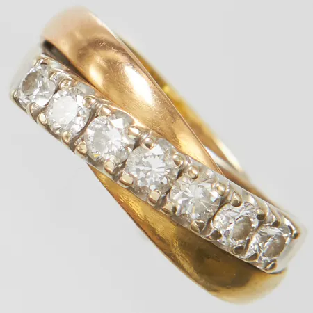 Ring med 7 briljantslipade diamanter 0,75ct enligt gravyr, ca Wesselton(H)/SI, stl17, bredd 6-7,5mm, vitguld/rödguld/roséguld, 18K  Vikt: 8 g