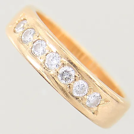 Ring med diamanter totalt 0,35ctv enligt gravyr, stl 17, bredd 5mm, gravyr, 18K Vikt: 6,5 g