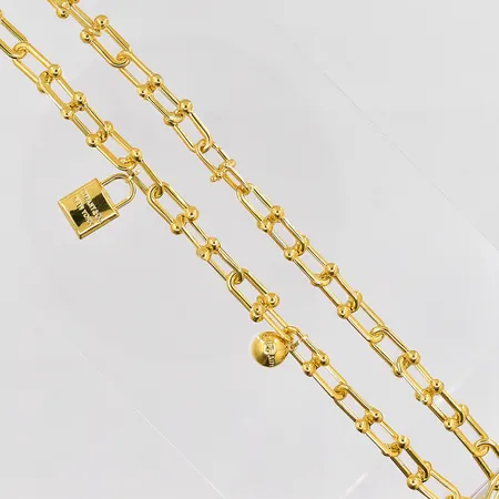 Collier med berlocker, 46cm, bredd ca 9,5mm, ihåligt, OBS EJ MÄRKESDESIGN, 18K Vikt: 15,7 g