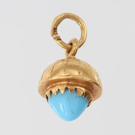 Hänge med blå sten, Ø12mm, 18K.  Vikt: 2,4 g