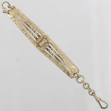 Chatelaine med dekor, längd: 12,5cm, bredd: 14mm, en ögla avklippt, 14K guld. Vikt: 17,5 g
