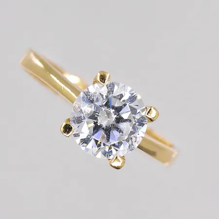 Ring med vit sten, stl 17½, ojämn skena, 14K Vikt: 2,4 g