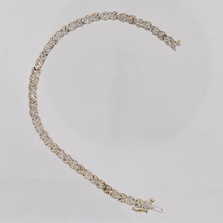 Armband med diamanter ca 132 x 0,005ct, 18,5cm, bredd 4,5mm, defekter, 18K Vikt: 10,4 g