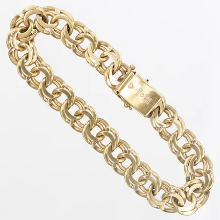 Armband Bismarck, längd: 20cm, bredd: 10mm, Svenska Guldvaruaktiebolaget T Be , Stockholm år 1964, kistlås, en låsåtta saknas, 18K guld.  Vikt: 37,5 g