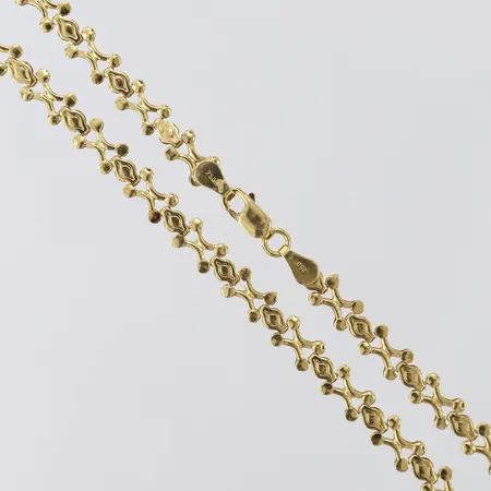 Collier halvstelt, längd 42cm, bredd 5,5mm, 18K.  Vikt: 13,1 g