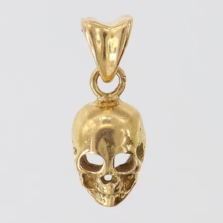 Hängen dödskalle, 18,5x7,8mm ink ögla, 18K.  Vikt: 2,2 g