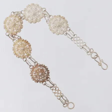 Armband med filigranarbete, längd 18,5cm, bredd 6-16mm, Silver 925/1000.  Vikt: 11,1 g