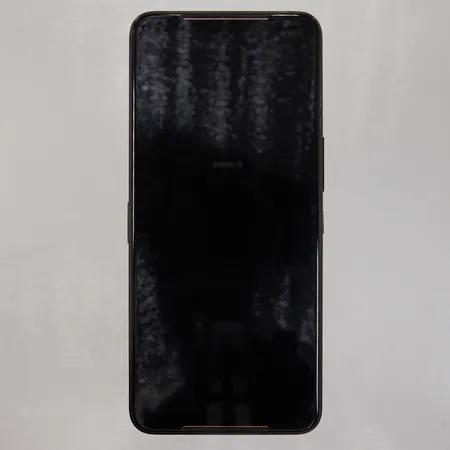 Mobiltelefon Asus ROG Phone II, Ultimate Edition, modell-nr: ZS660KL, serie-nr: KBAIKN054994N69, laddare, fläkt, manual, originalbox med mindre slitage. Skickas med postpaket.