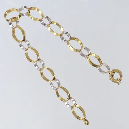 Armband tvåfärgad, längd 19,5cm, bredd 7,5-9mm, 18K.  Vikt: 6,3 g