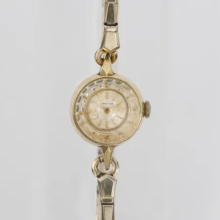 Damur Certina, 18K, manuell, Ø11mm, plexiglas, flexiband i förgyllt stål, bruksslitage, bruttovikt: 16,8g. 