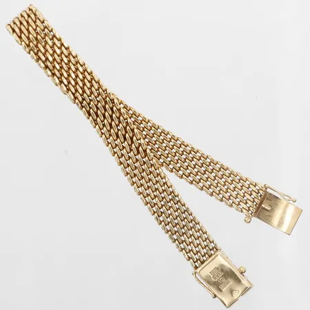 Armband, flerradigt, längd: 19cm, bredd: 10mm, Svenska Guldvaruaktiebolaget T Be, Stockholm år 1964, 18K guld.  Vikt: 40,8 g