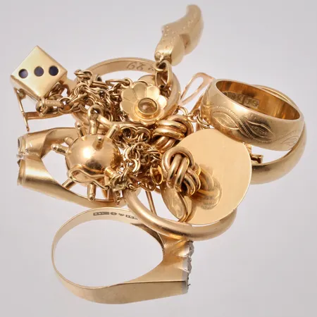 Diverse defekt guld 18K, vikt 39,42g.