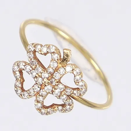 Ring med vita stenar i form av fyrklöver stl 17 bredd 1-11mm 18K Vikt: 1,3 g