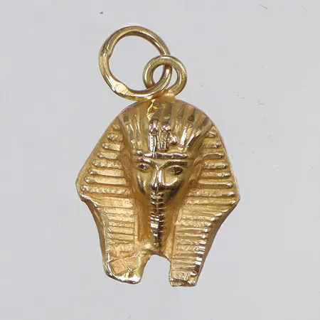 Hänge i form av Tutankhamon 13x21mm inklusive hängöglan 18K Vikt: 1,2 g