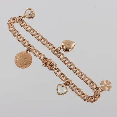 Armband 18k Bismarck med 5 st berlocker,längd ca 20 cm,bredd 5.4 mm. Vikt: 15,6 g