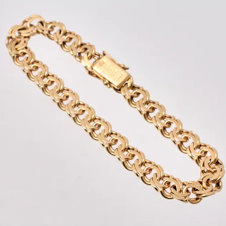 Armband i 18K guld, 20,5cm, Bismarck, bredd 8mm, tillverkad av Vidar Fors Haldor, år 1967, vikt 25,7g.