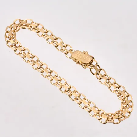 Armband Xlänk 19,5cm bredd 6,3mm 18K 10,83g.