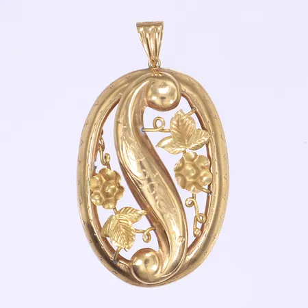 Hänge med genombruten floral dekor, 45x25mm inkl. ögla, tillv. Juvelfabriken Ab, Stockholm 1944, något bucklig, tennlödningar på baksida av smycke, 18K Vikt: 3,2 g