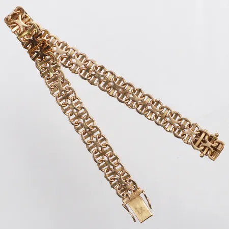 Armband x-länk med stav längd 19,5cm bredd 8,4mm Lindgrens Juvelerare & Guldsmedsa år 1966, trögt lås, 18K Vikt: 18,5 g