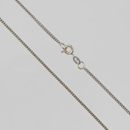 Kedja 48cm, bredd:1,6mm, vitguld 18K 5,6g.