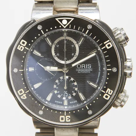 Herrur Oris Prodiver Chronograph titan automatisk 51mm, ref 01 674 7630 7154, serienr 3101506, cal. ETA7750, safirglas, kronograf, titanlänk, extra gummiarmband, viklås, extra länkbit, manual, justeringsverktyg, defekt klockkudde, certifikat från Franks Ur 2013, box. 