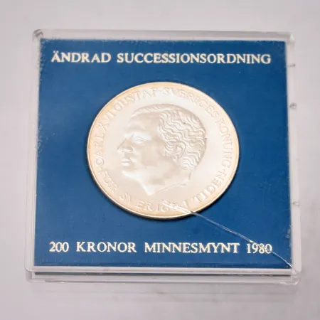 Minnesmynt 200kr, ändrad successionsordning 1980, 925/1000 silver plastetui 27 g Vikt: 27 g