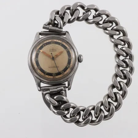 Herrur Perfecta Vatten-Stötsäker,slitage/repor,diameter ca 33.4 mm,tickar igång men ej funktionstestad.