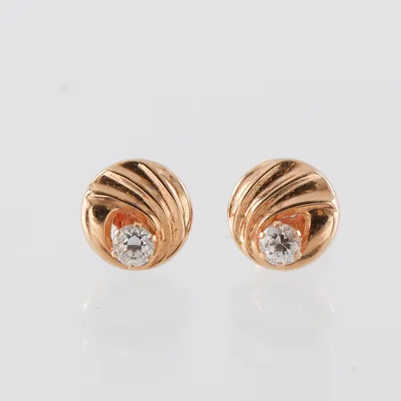 Örhängen paret 18k med stenar,diameter ca 7.8 mm. Vikt: 0,8 g