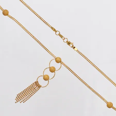 Collier med integrerat hänge längd 41cm bredd 1,8mm hängdel 10,5x52mm, något defekt på kulan, 21K Vikt: 7,7 g