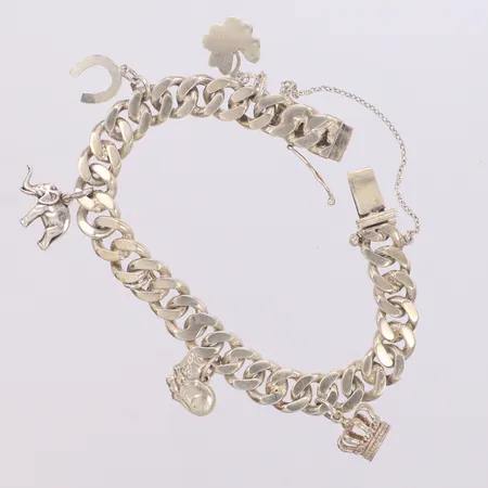 Armband med sex berlocker, längd 19cm, bredd 9,6mm, 925/1000 silver Vikt: 38,2 g