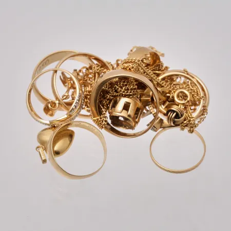 Diverse defekt guld, 18K 40,42g.