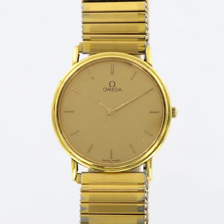 Herrur Omega quartz Ø32mm, caliber: 1377, anfrätta visare, 18K i boett, flexilänk i gulmetall 