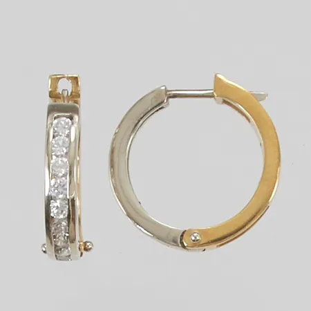 Ett par örhängen 20mm vita stenar 18K 7,4g.