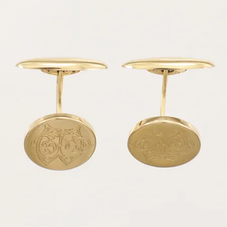 Ett par manschettknappar med monogramgravyr, Ø ca 16mm, Guldvaruaktiebolaget G. Dahlgren & Co Ab Malmö år 1907, 18K Vikt: 7,1 g