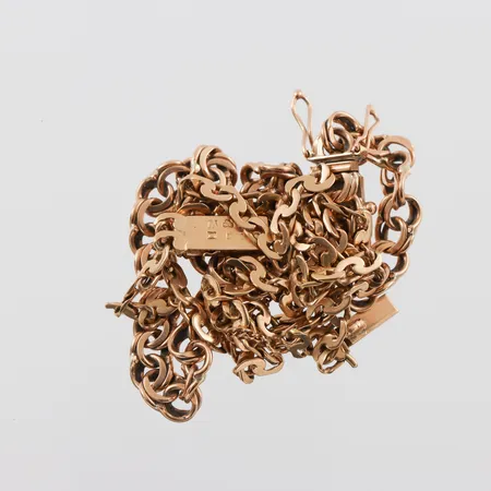 Trasigt guld 18k. Vikt: 22,6 g