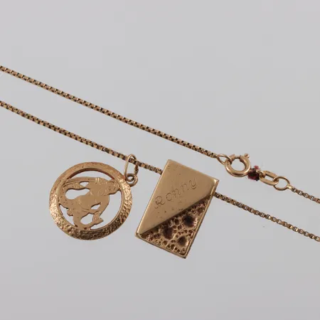 Trasigt guld 18k. Vikt: 5,6 g