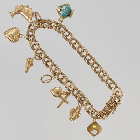 Armband Bismarck 19,5cm, bredd:6mm, berlocker, 18K 20,7g.