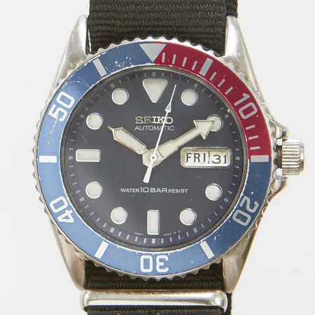 Herrur Seiko Diver, stål, automatisk, 42mm, ref 7S26-0040, snr 746335, safirglas, datum, dag, natoband ej original, repig boett, repig samt defekt dykring, inga tillbehör. 